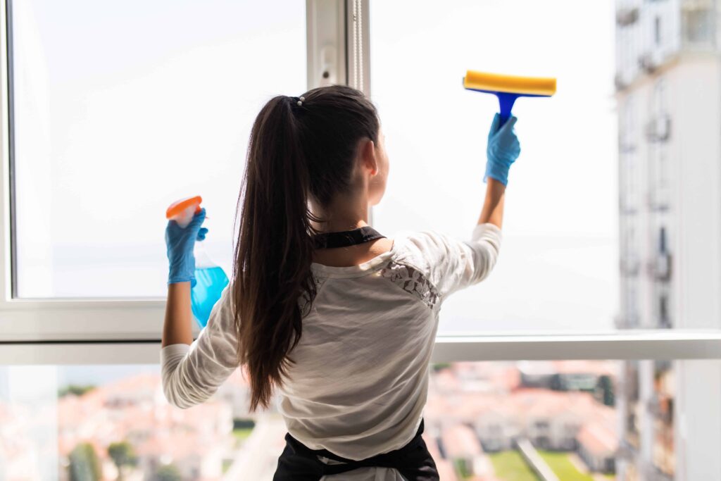 girl cleaning windows