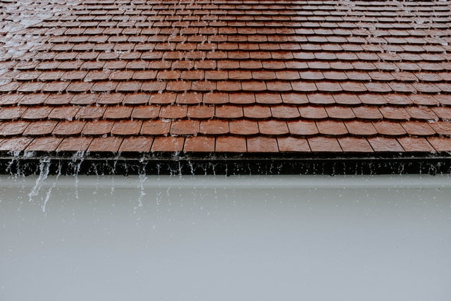 Reds tile roof with rain