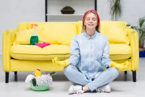 woman-with-cleaning-gloves-doing-yoga.jpg 